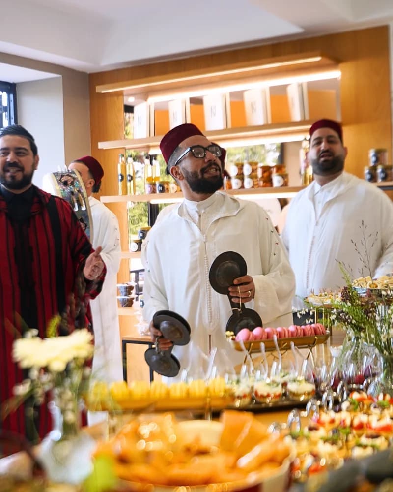 Equipe traiteur MB Gourmet en service evenementiel — buffet sucre